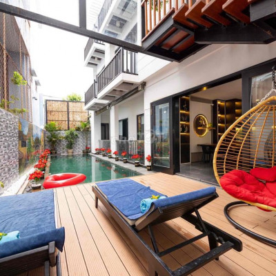 tôi cần bán căn villa sát biển cửa đại hiện đang kinh doanh tốt